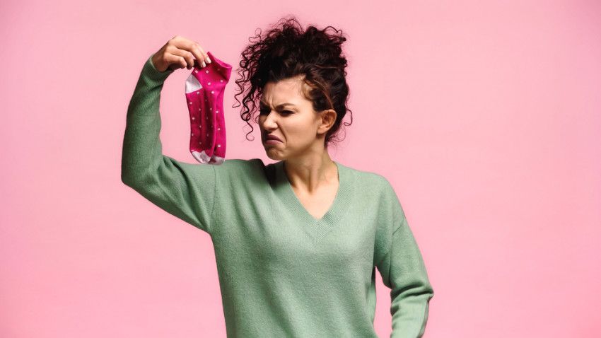 Onaangename geuren verwijderen uit kleding
