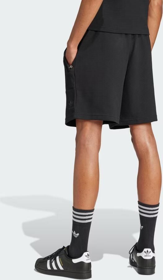 Adidas Originals Korte regular fit broek met structuurmotief - Foto 4