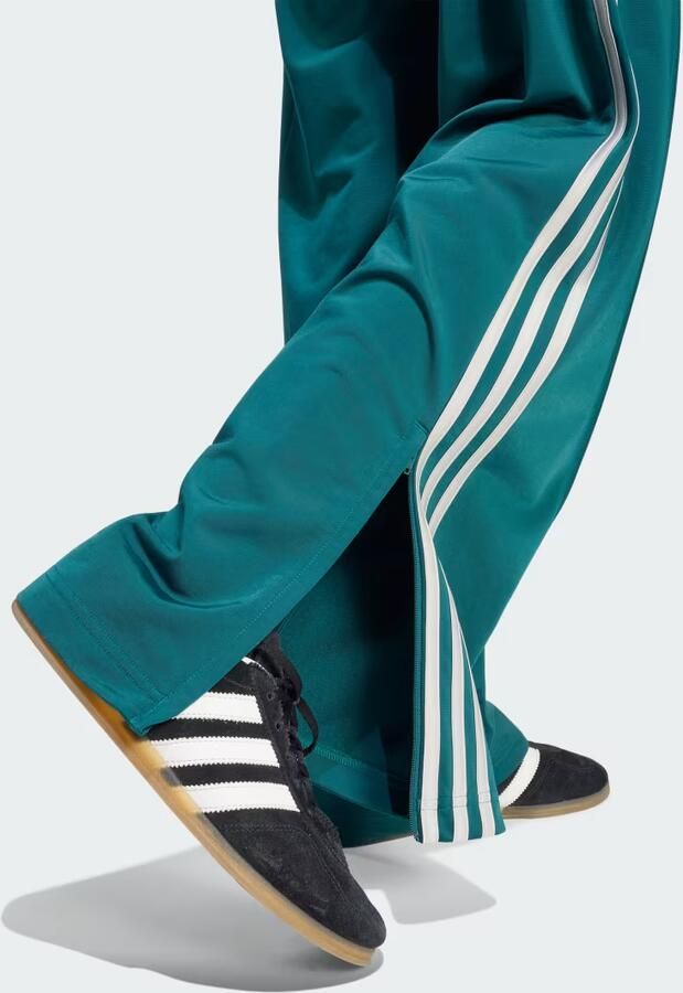 Adidas Originals Loose fit sweatbroek met contraststrepen - Foto 4