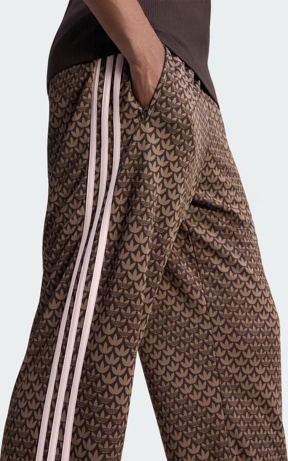 Adidas Originals loose fit sweatpants met logomotief model 'FIREBIRD' - Foto 4