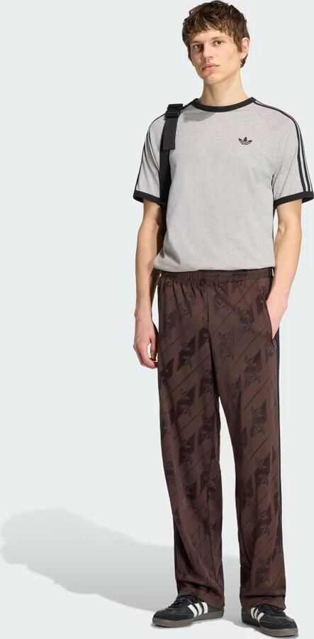 Adidas Originals relaxed fit joggingbroek met all-over logoprint - Foto 5