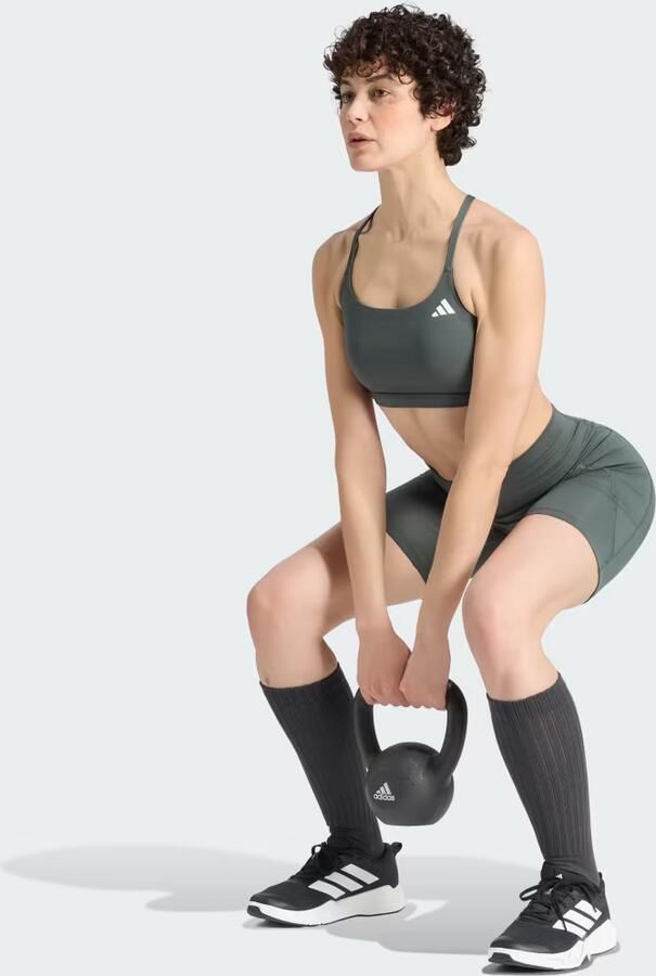 Adidas Optimé Essentials Korte Legging met Zakje 7-Inch - Foto 4