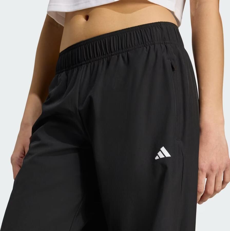 Adidas Sportswear Wide fit stoffen broek met logoprint