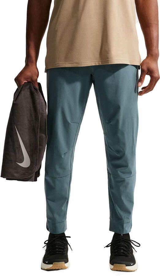Nike Unlimited Dri-FIT veelzijdige herenbroek met ritsboord Grijs - Foto 4