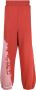 A-COLD-WALL* Trainingsbroek met tie-dye print Rood - Thumbnail 1