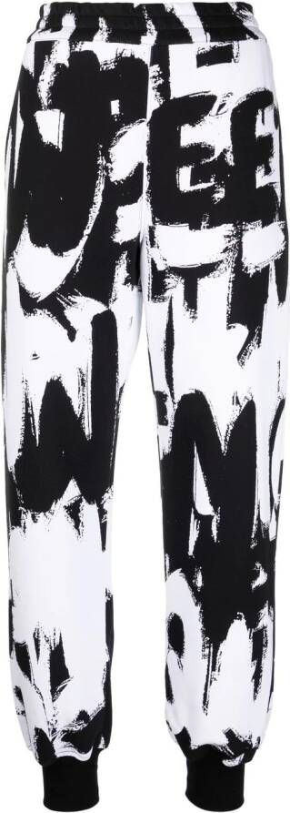 Alexander McQueen Trainingsbroek met graffiti-print Zwart