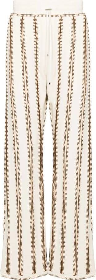 AMIRI Gestreepte trainingsbroek Beige