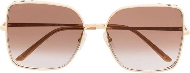 Cartier Eyewear Zonnebril met panterpatroon Goud