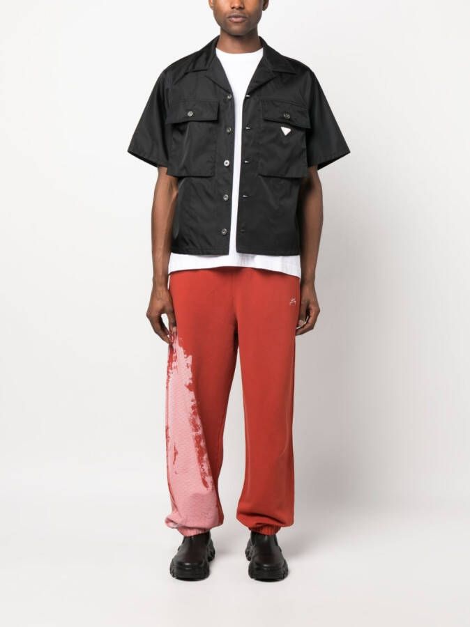 A-COLD-WALL* Trainingsbroek met tie-dye print Rood