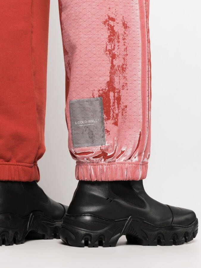 A-COLD-WALL* Trainingsbroek met tie-dye print Rood