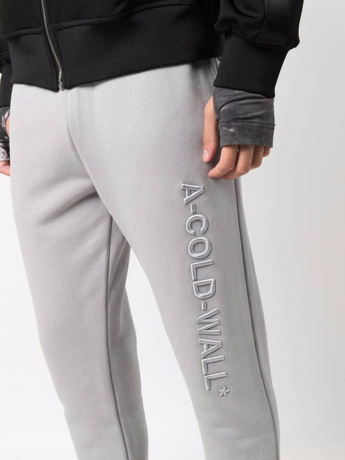 A-COLD-WALL* Trainingsbroek met logo reliëf Grijs
