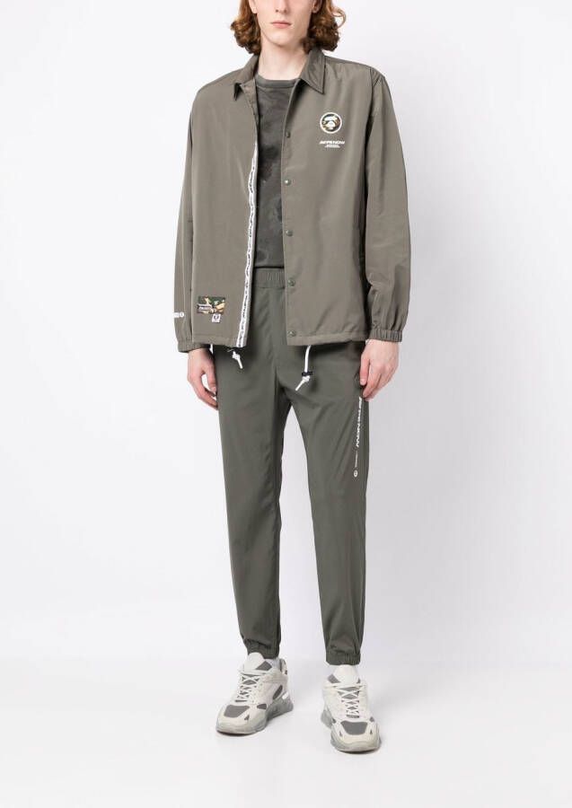 AAPE BY *A BATHING APE Trainingsbroek met logoprint Groen
