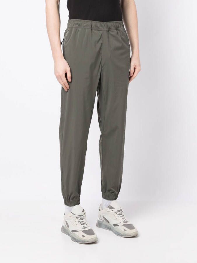 AAPE BY *A BATHING APE Trainingsbroek met logoprint Groen