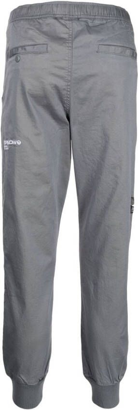 AAPE BY *A BATHING APE Broek met toelopende pijpen Grijs
