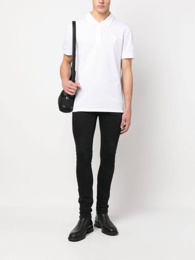 Alexander McQueen Poloshirt met doodskoppatch Wit