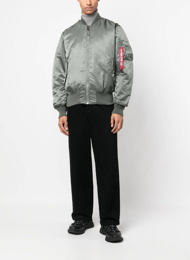 Alpha Industries Bomberjack met ritszak Groen