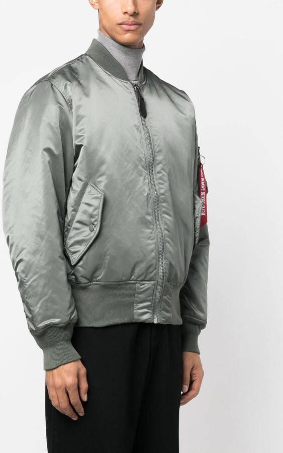 Alpha Industries Bomberjack met ritszak Groen
