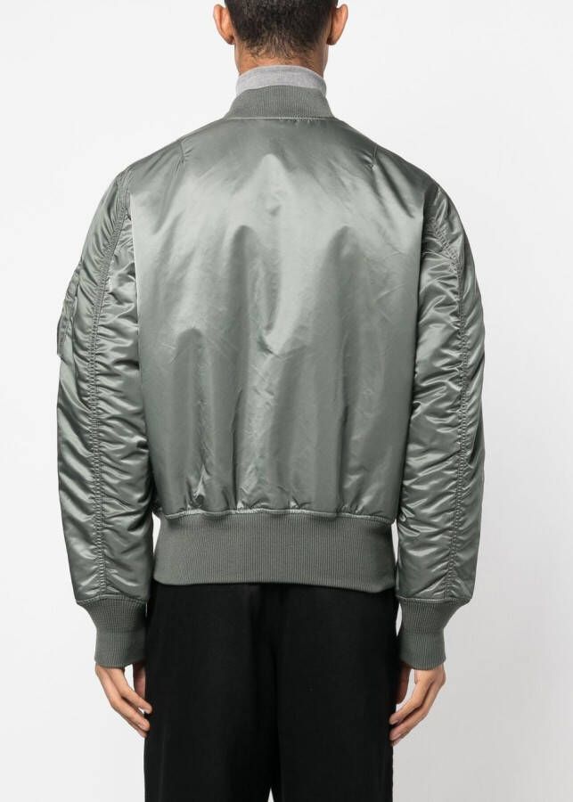 Alpha Industries Bomberjack met ritszak Groen