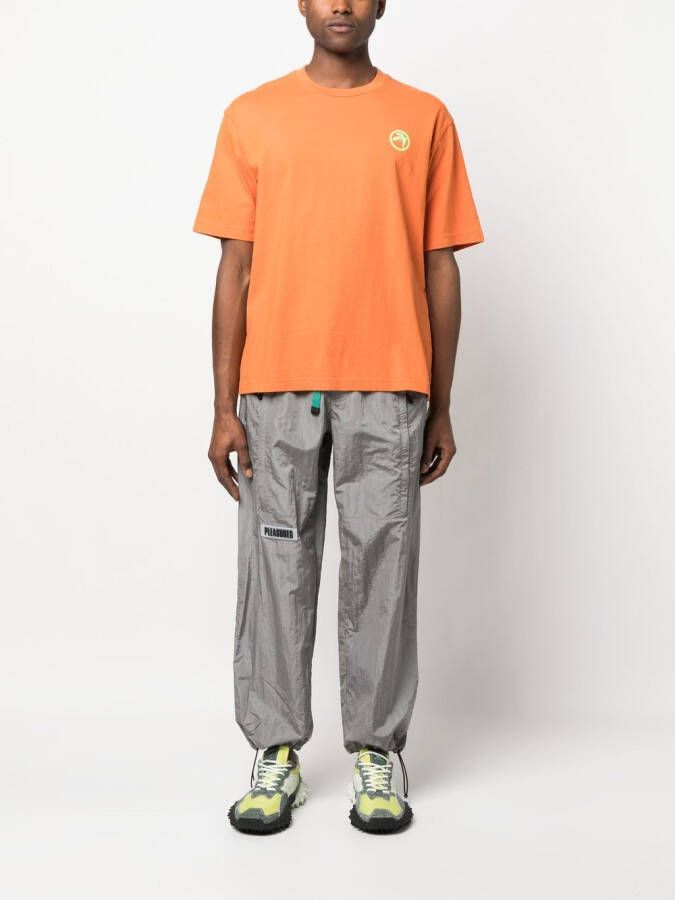 AMBUSH T-shirt met logoprint Oranje