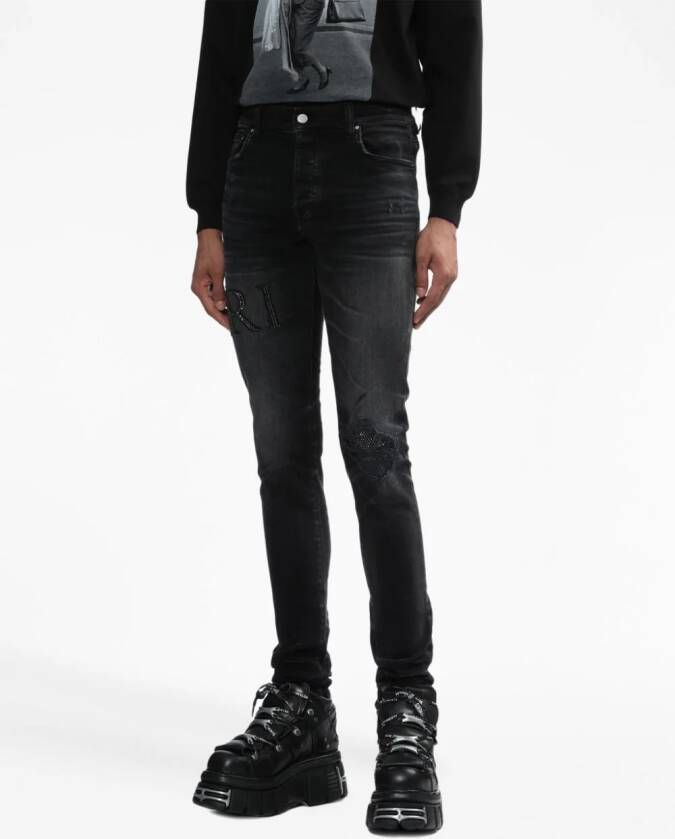 AMIRI Gerafelde jeans Zwart