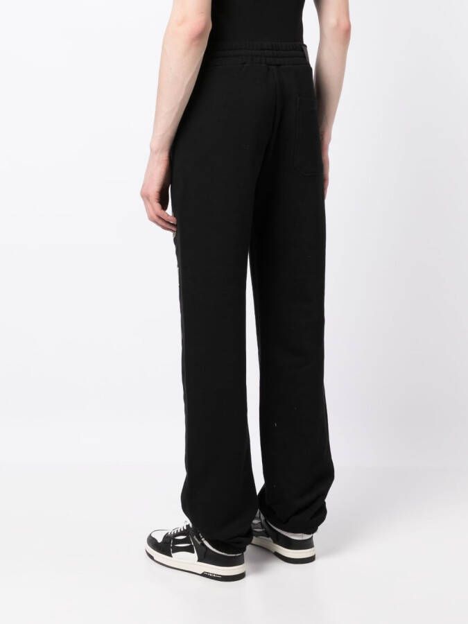AMIRI Broek met grafische print Zwart