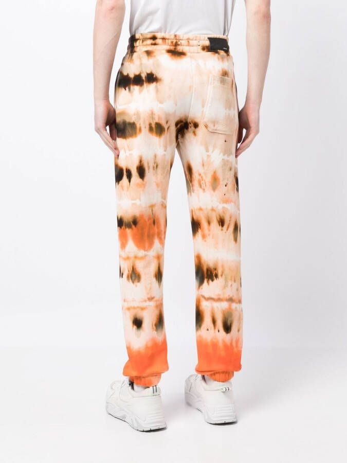AMIRI Trainingsbroek met tie-dye print Bruin