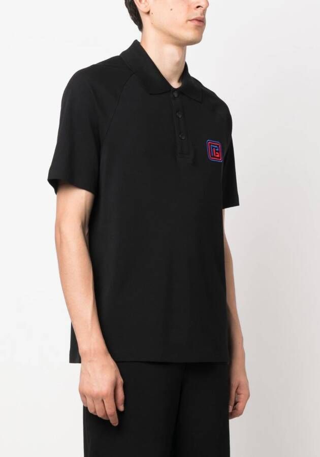 Balmain Poloshirt met geborduurd logo Zwart
