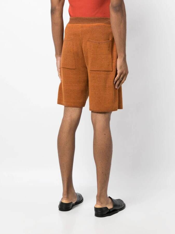 Bianca Saunders Knielange shorts Oranje