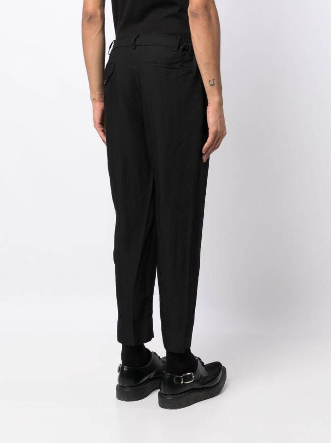 Black Comme Des Garçons Broek met toelopende pijpen Zwart