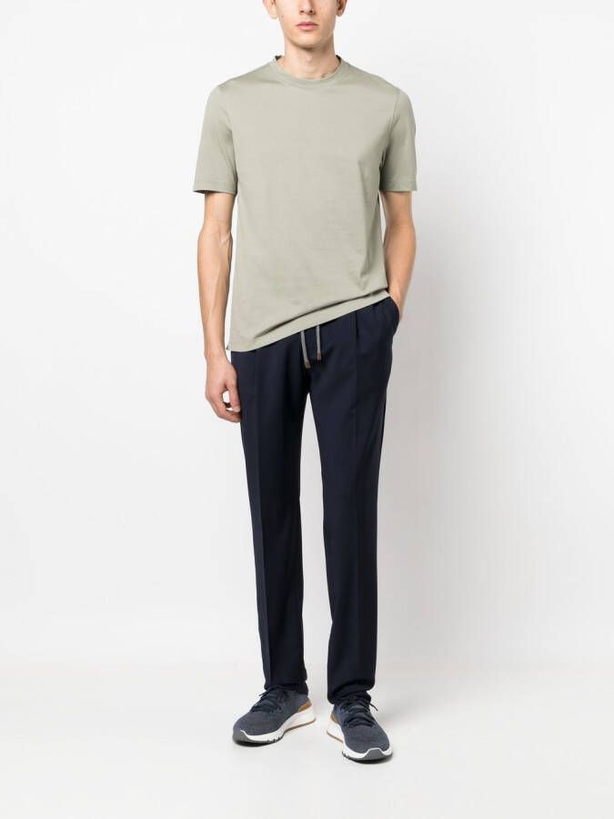 Brunello Cucinelli Broek met toelopende pijpen Blauw