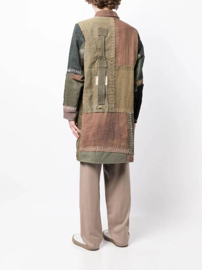 By Walid Jas met enkele rij knopen Bruin