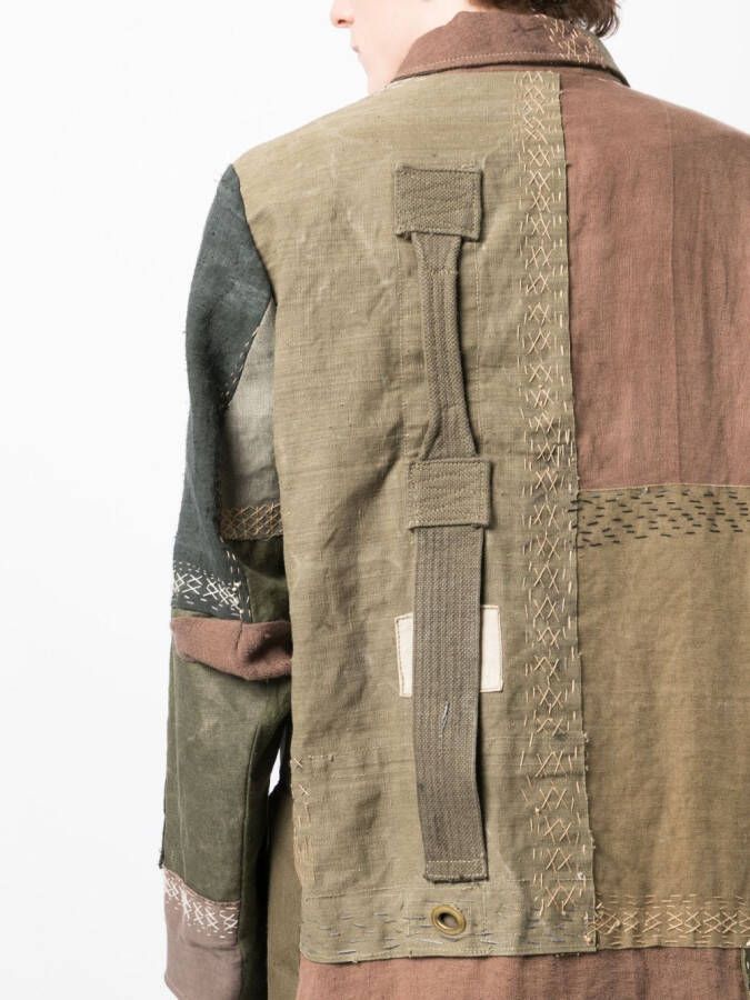 By Walid Jas met enkele rij knopen Bruin