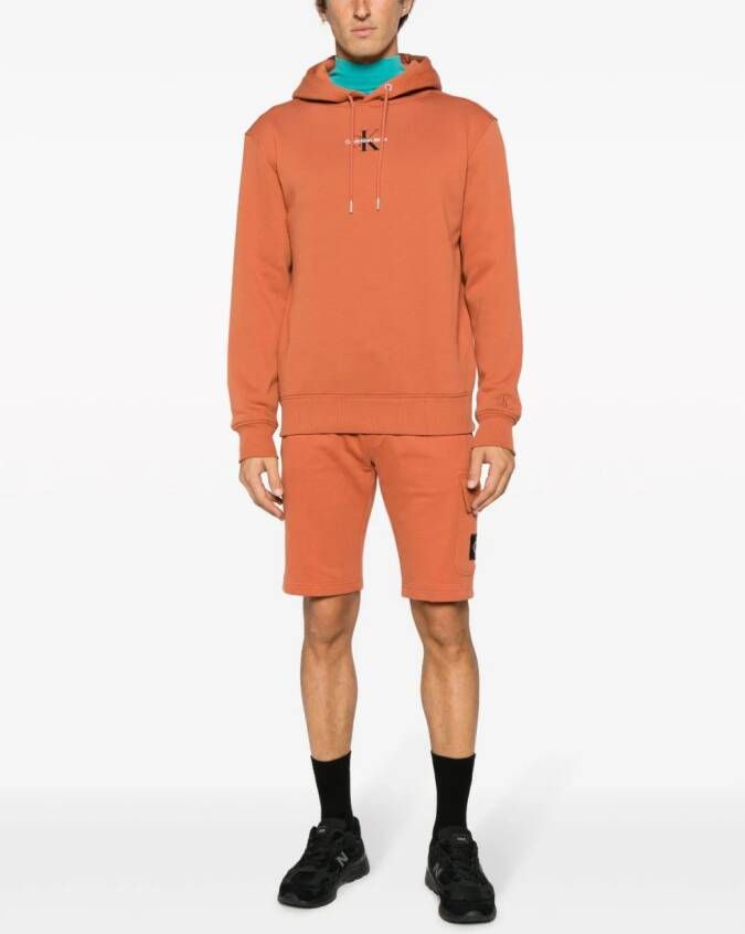 Calvin Klein Jeans Trainingsbroek met logopatch Oranje