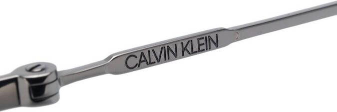 Calvin Klein Zonnebril met rond montuur Blauw