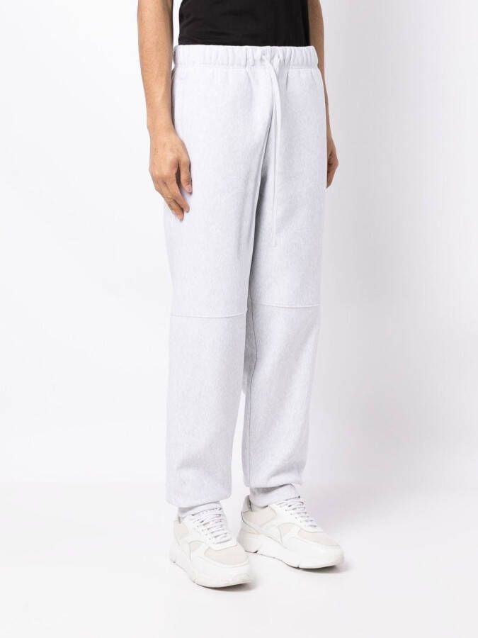 Carhartt WIP Trainingsbroek met geborduurd logo Grijs