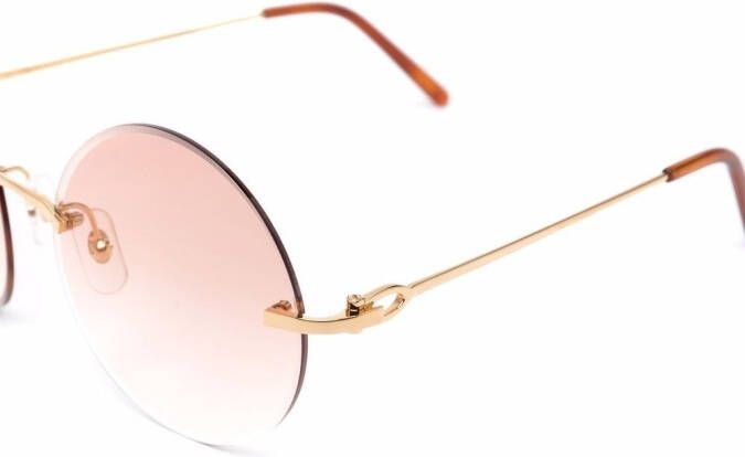 Cartier Eyewear C Décor zonnebril met rond montuur Goud