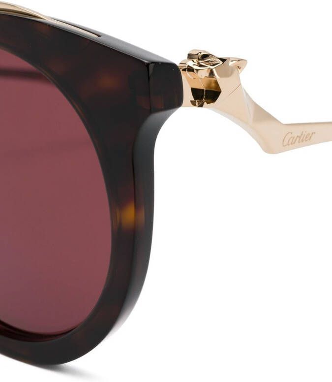 Cartier Eyewear zonnebril met rond montuur Bruin