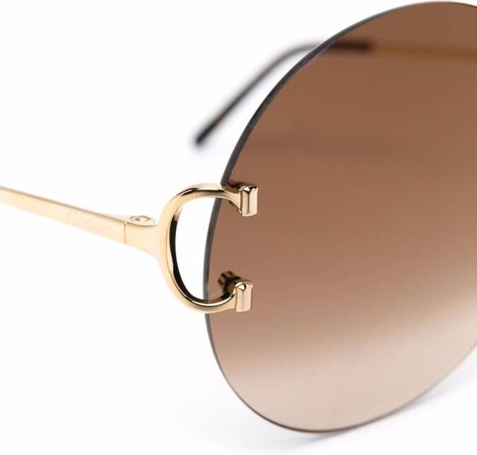 Cartier Eyewear Zonnebril met rond montuur Goud
