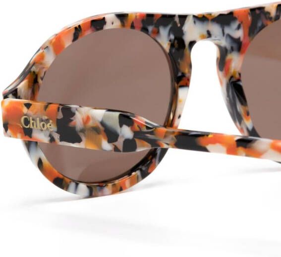 Chloé Eyewear Zonnebril met rond montuur Oranje