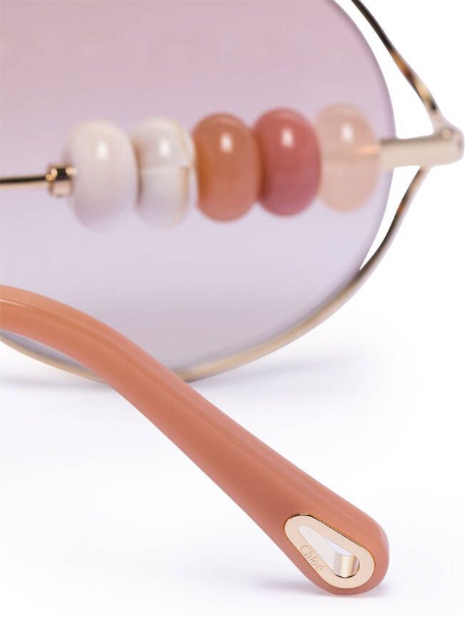 Chloé Eyewear Zonnebril met rond montuur Roze