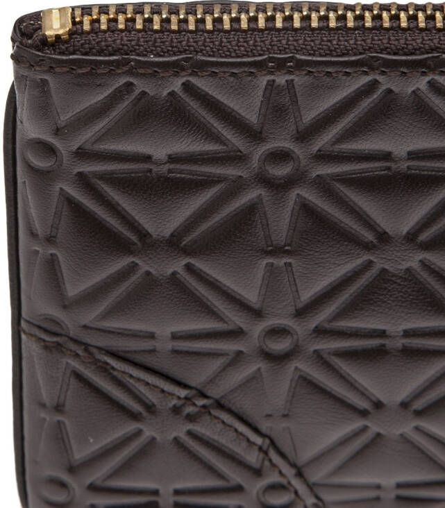 Comme Des Garçons Wallet star embossed zip wallet Bruin