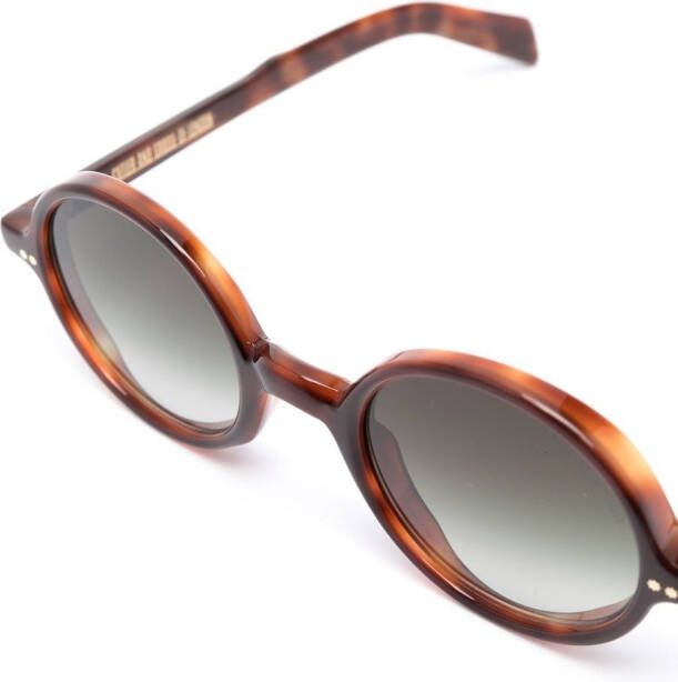 Cutler & Gross Zonnebril met rond montuur Bruin