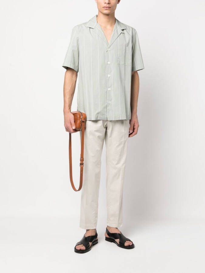 Dell'oglio Chino met geplooid detail en toelopende pijpen Beige