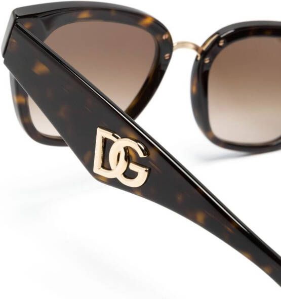 Dolce & Gabbana Eyewear DG Crossed zonnebril met logo Bruin