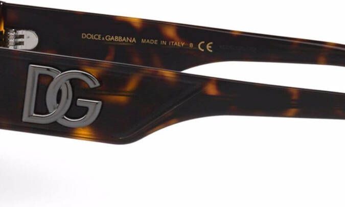 Dolce & Gabbana Eyewear DG zonnebril met gekruiste montuur Bruin