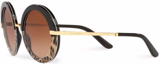 Dolce & Gabbana Eyewear Zonnebril met rond montuur Bruin