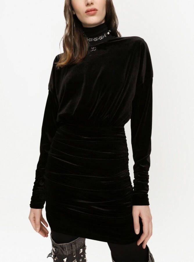 Dolce & Gabbana Gedrapeerde fluwelen mini-jurk met DG-logo Zwart