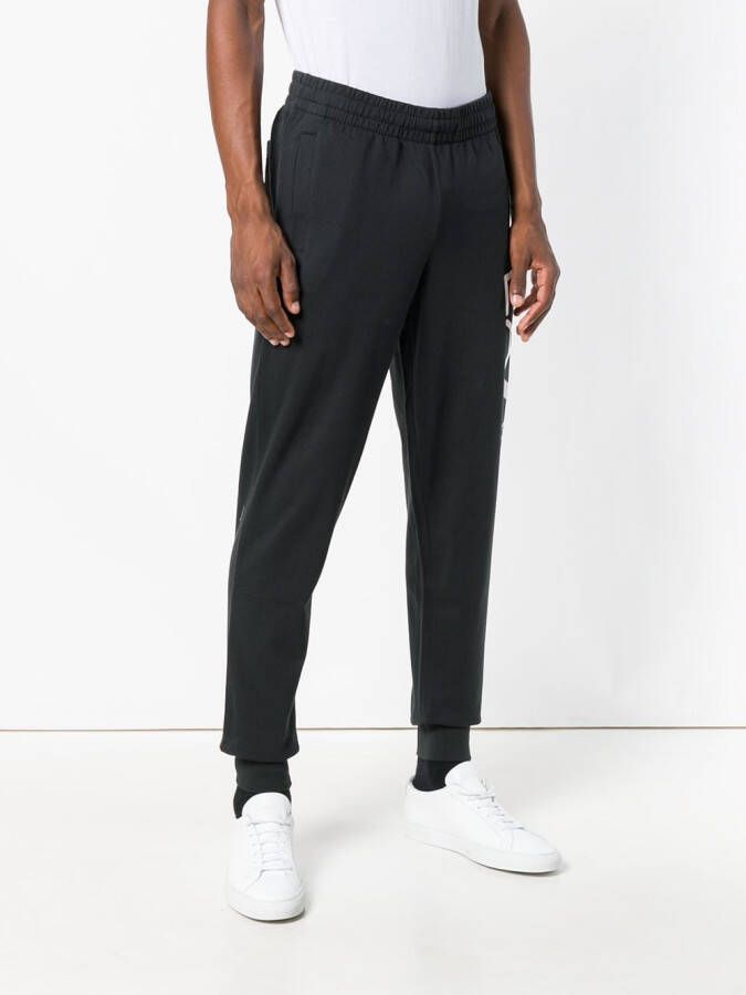 Ea7 Emporio Armani trainingsbroek met logo Zwart