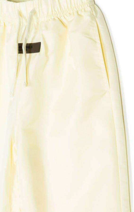 FEAR OF GOD ESSENTIALS Trainingsbroek met logopatch Beige