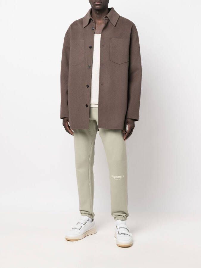 FEAR OF GOD ESSENTIALS Slim-fit trainingsbroek Groen
